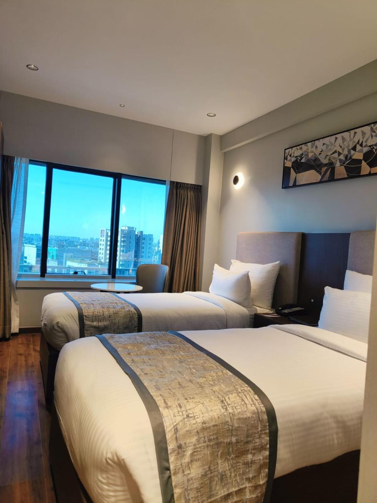 Ramee International Surat Hotel Bagian luar foto
